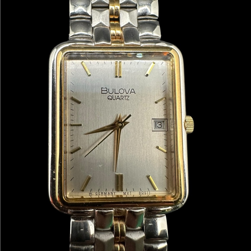 Bulova Two-Tone Silver and Gold Rectangular Dress Watch. New old stock. Unused